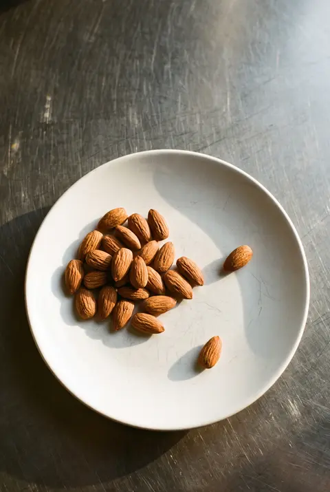 Almonds on a white plate