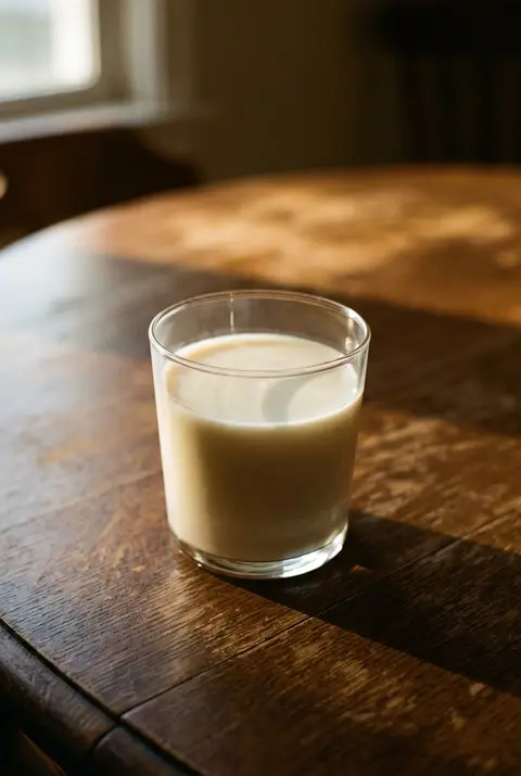 250 ml of oat milk in a clear tumbler